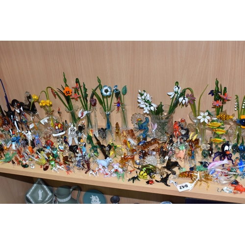 842 - A COLLECTION OF GLASS LAMPWORK ANIMALS AND FLOWERS, approximately two hundred pieces, to include sev... 