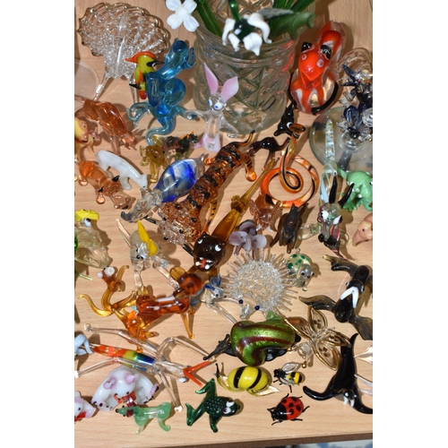 842 - A COLLECTION OF GLASS LAMPWORK ANIMALS AND FLOWERS, approximately two hundred pieces, to include sev... 