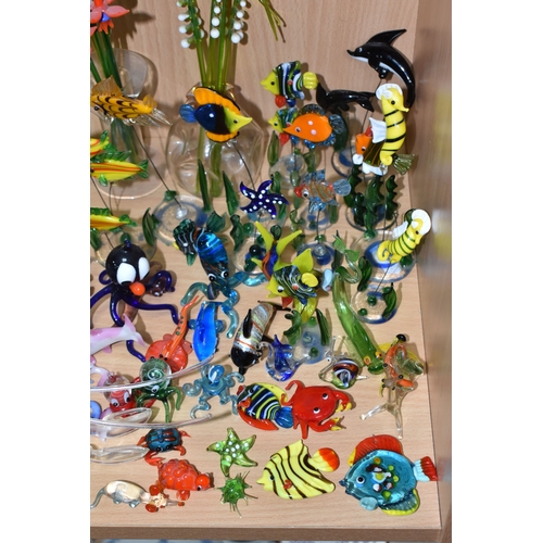 842 - A COLLECTION OF GLASS LAMPWORK ANIMALS AND FLOWERS, approximately two hundred pieces, to include sev... 
