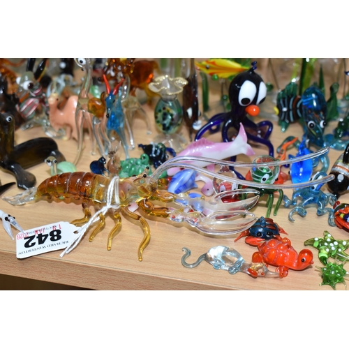 842 - A COLLECTION OF GLASS LAMPWORK ANIMALS AND FLOWERS, approximately two hundred pieces, to include sev... 