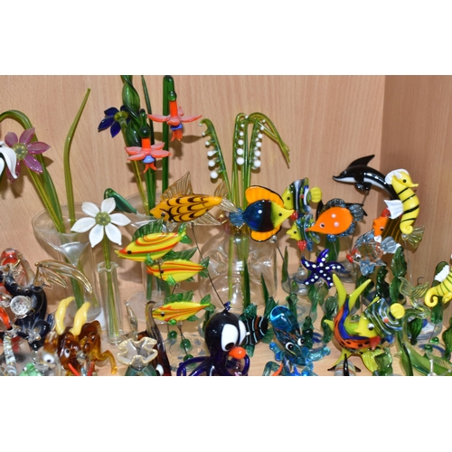 842 - A COLLECTION OF GLASS LAMPWORK ANIMALS AND FLOWERS, approximately two hundred pieces, to include sev... 