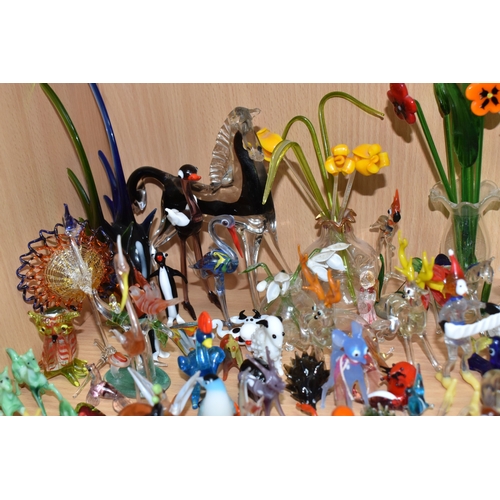 842 - A COLLECTION OF GLASS LAMPWORK ANIMALS AND FLOWERS, approximately two hundred pieces, to include sev... 