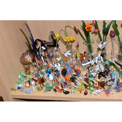 842 - A COLLECTION OF GLASS LAMPWORK ANIMALS AND FLOWERS, approximately two hundred pieces, to include sev... 