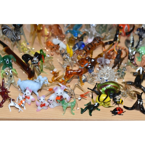842 - A COLLECTION OF GLASS LAMPWORK ANIMALS AND FLOWERS, approximately two hundred pieces, to include sev... 