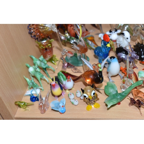 842 - A COLLECTION OF GLASS LAMPWORK ANIMALS AND FLOWERS, approximately two hundred pieces, to include sev... 