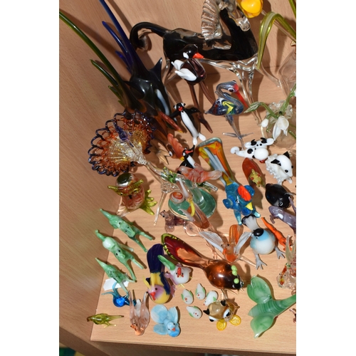 842 - A COLLECTION OF GLASS LAMPWORK ANIMALS AND FLOWERS, approximately two hundred pieces, to include sev... 