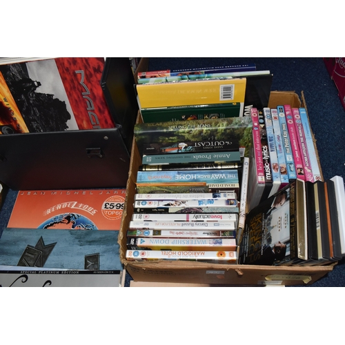 FOUR BOXES AND A CASE OF BOOKS, RECORDS, CDS AND DVDS, to include over ...