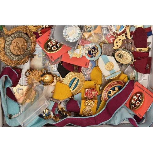 THREE TRAYS OF MASONIC REGALIA, to include jewels, medals with ribbons ...