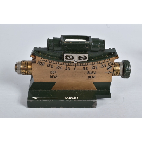 A WWII 1944 VICKERS CLINOMETER, COMPASS, BUGLE AND CAP BADGES, the ...