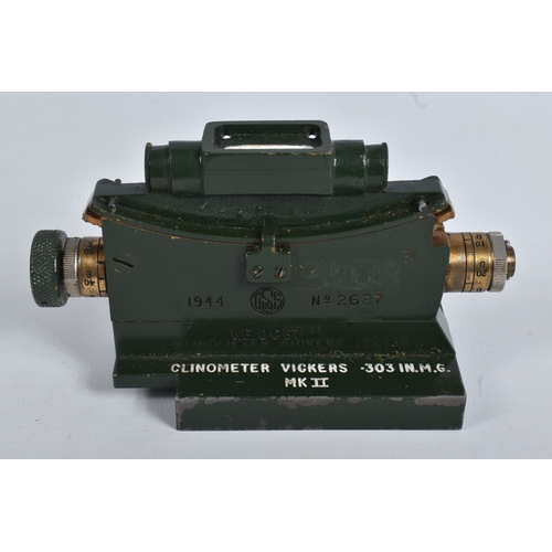 A WWII 1944 VICKERS CLINOMETER, COMPASS, BUGLE AND CAP BADGES, the ...