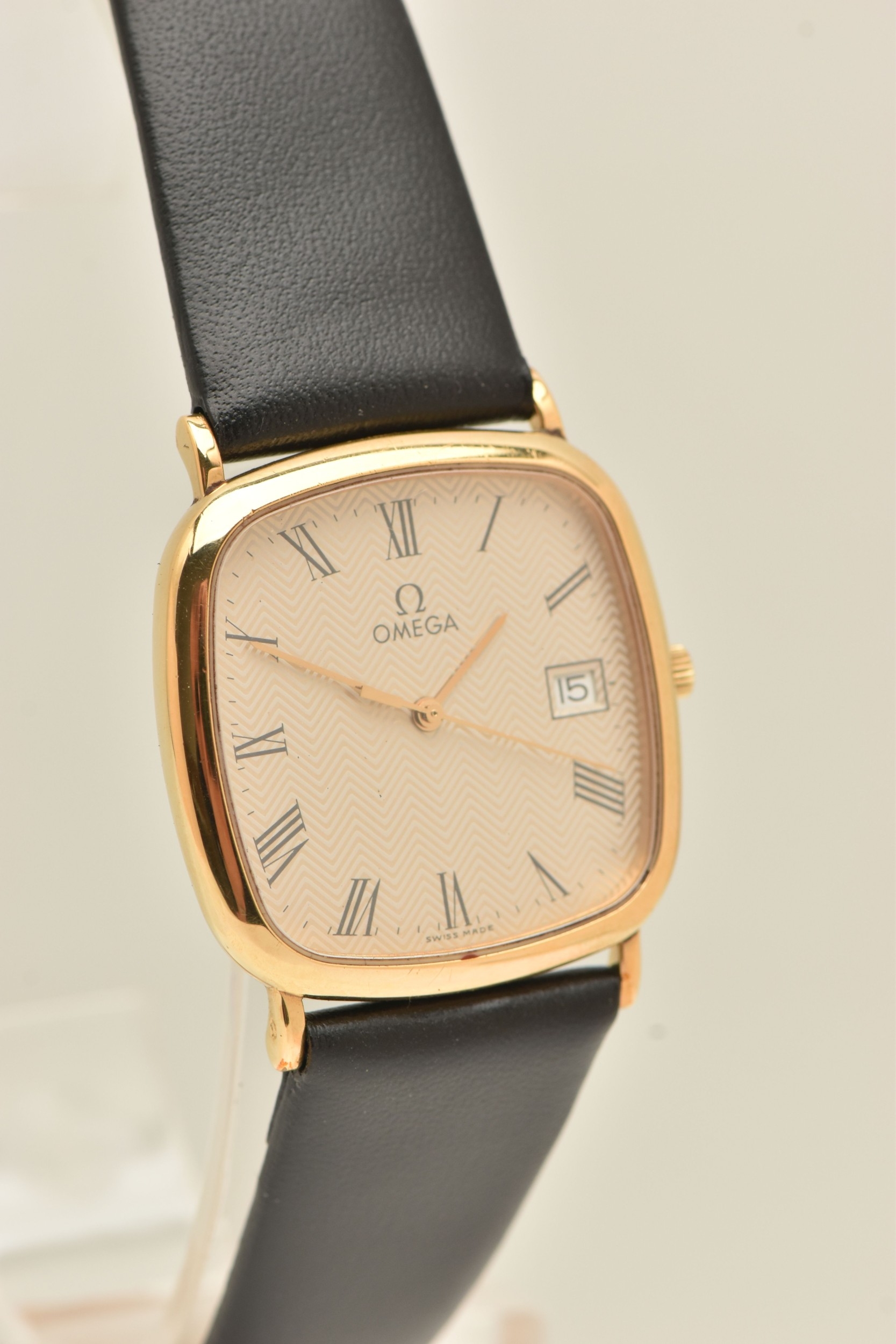 AN 'OMEGA' WRISTWATCH, quartz movement, square form dial with chevron ...