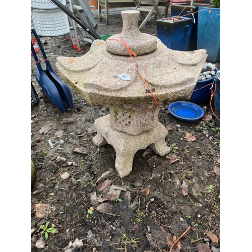 24 - A PINK GRANITE PAGODA constructed in four sections 65cm high Condition Report; no obvious damage