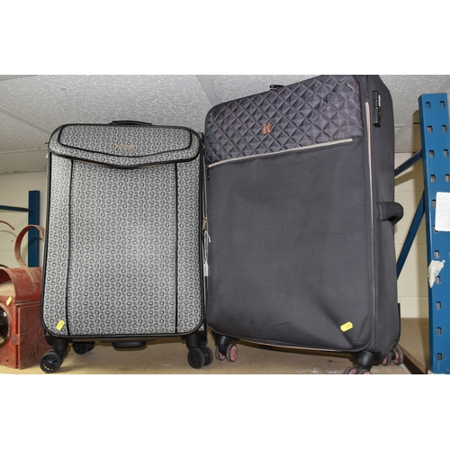 A GUESS CASSIAN MEDIUM SOFT SHELL SUITCASE, featured in grey with ...