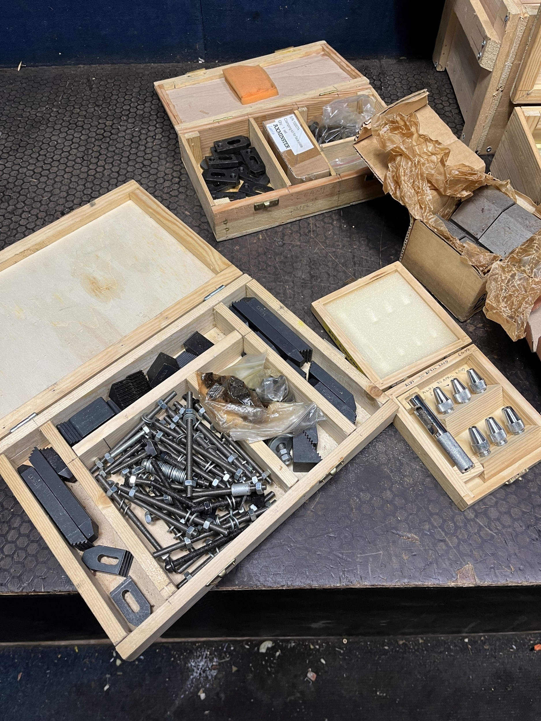 FOUR WOODEN BOXES CONTAINING MILLING MACHINE ACCESSORIES AND MARKING ...