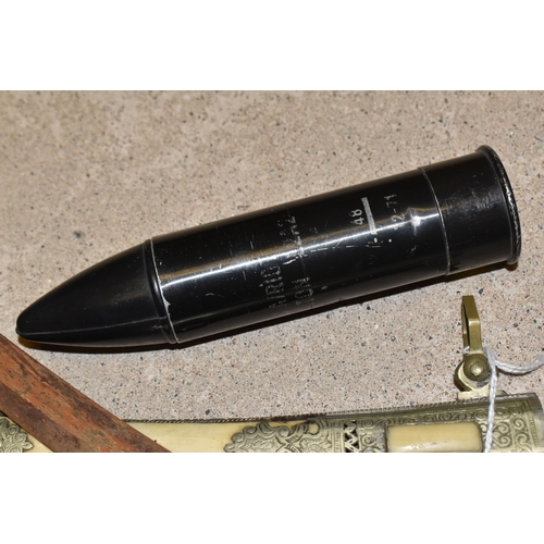 A 1.5-INCH L2A2 ANTI-RIOT RUBBER BATON ROUND (RUBBER BULLET), dated ...