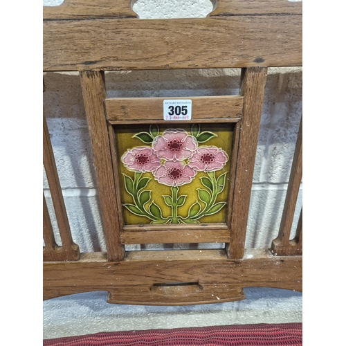 305 - AN ANGLO INDIAN TEAK BENCH, with a railway-style swinging back rest, inlaid with various tiles, rais... 