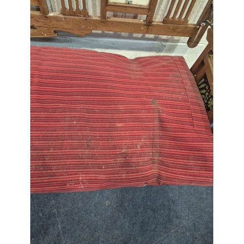 305 - AN ANGLO INDIAN TEAK BENCH, with a railway-style swinging back rest, inlaid with various tiles, rais... 