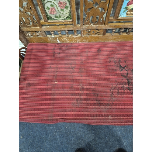 306 - AN ANGLO INDIAN TEAK BENCH, with a railway-style swinging back rest, inlaid with various tiles, rais... 