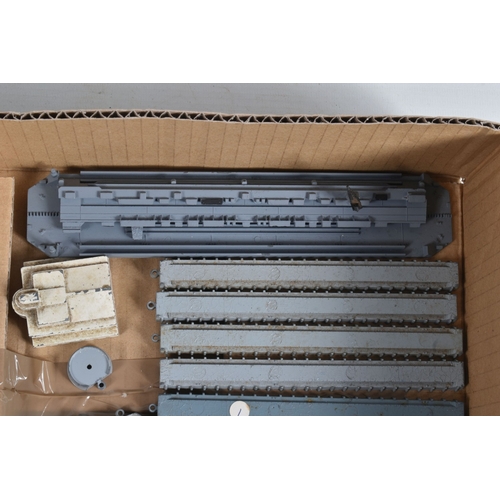 47 - A QUANTITY OF UNBOXED TRI-ANG MINIC SHIPS AND ACCESSORIES, to include part repainted HMS 'Centaur', ... 