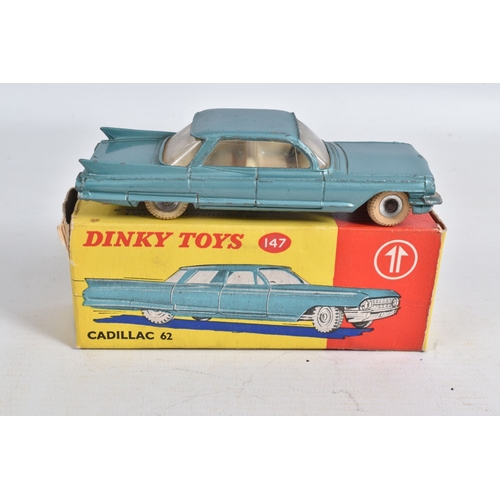 53 - A BOXED DINKY TOYS CADILLAC 62, No.147, metallic aqua blue with white interior, spun hubs and white ... 