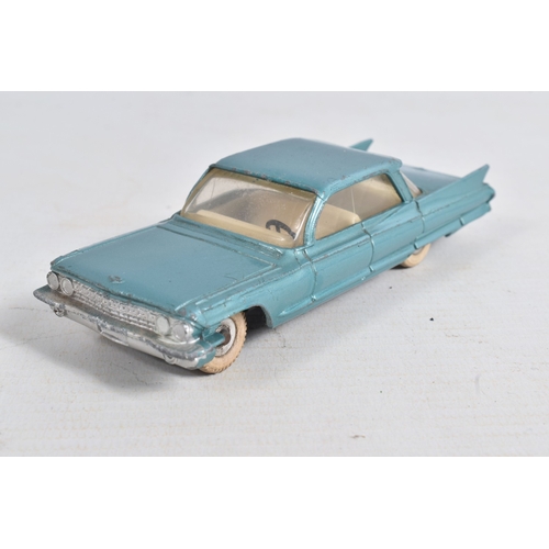 53 - A BOXED DINKY TOYS CADILLAC 62, No.147, metallic aqua blue with white interior, spun hubs and white ... 