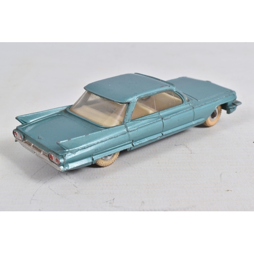 53 - A BOXED DINKY TOYS CADILLAC 62, No.147, metallic aqua blue with white interior, spun hubs and white ... 