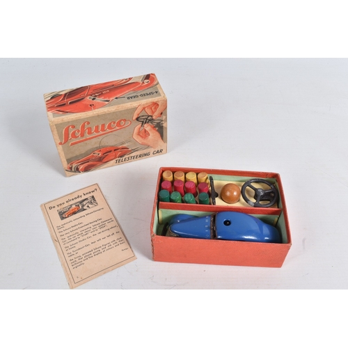 57 - TWO BOXED SCHUCO TELESTEERING CAR 3000 SETS, one with blue car, the other green, both appear complet... 