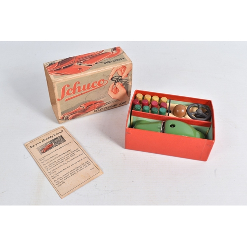 57 - TWO BOXED SCHUCO TELESTEERING CAR 3000 SETS, one with blue car, the other green, both appear complet... 