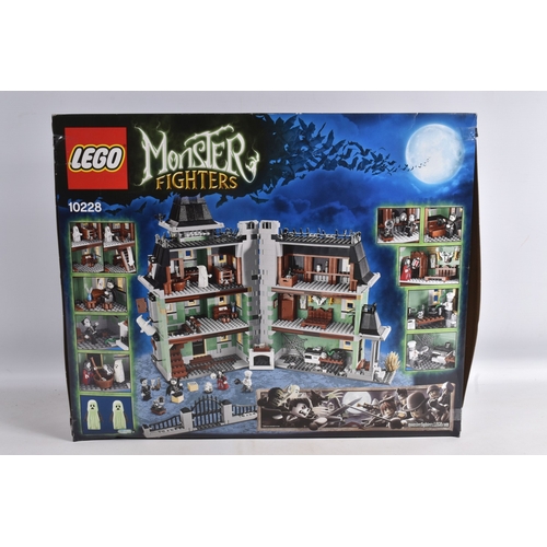 75 - A BOXED LEGO MONSTER FIGHTERS HAUNTED HOUSE, reference 10228, appears new with sticker tabs numbered... 