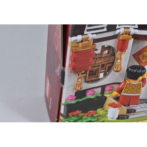 83 - A SEALED BOXED LEGO CHINESE NEW YEAR'S EVE DINNER, reference 80101, factory sticker tabs sealed 44G8... 