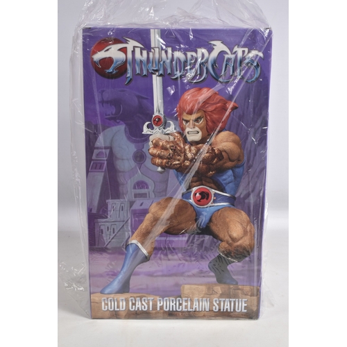 87 - A SEALED BOXED HARD HERO WARNER BROS THUNDERCATS LION-O 14   COLD CAST PORCELAIN STATUE, boxed opene... 