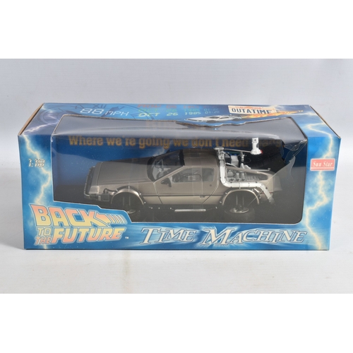 100 - TWO BOXED FILM RELATED MODEL VEHICLES, the first a Tomy A Team electronic van, no. 71467, box still ... 