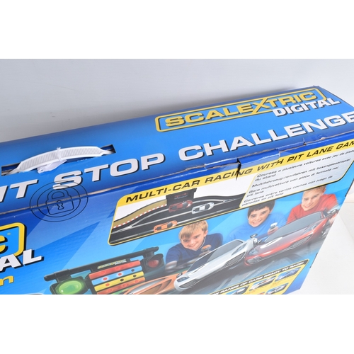 119 - A BOXED HORBY SCALEXTRIC DIGITAL PITSTOP CHALLENGE SET, C1296, set appears new with all parts sealed... 