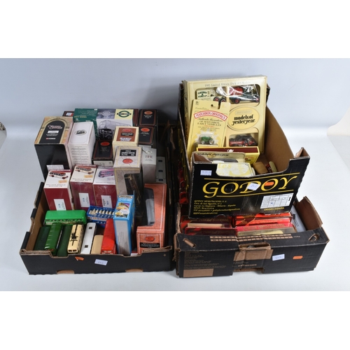 192 - A QUANTITY OF BOXED AND LOOSE DIECAST TRAMS, BUSES, COACHES, AND TRANSPORT MODELS, included is a lar... 