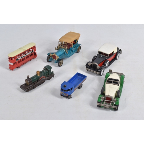 192 - A QUANTITY OF BOXED AND LOOSE DIECAST TRAMS, BUSES, COACHES, AND TRANSPORT MODELS, included is a lar... 