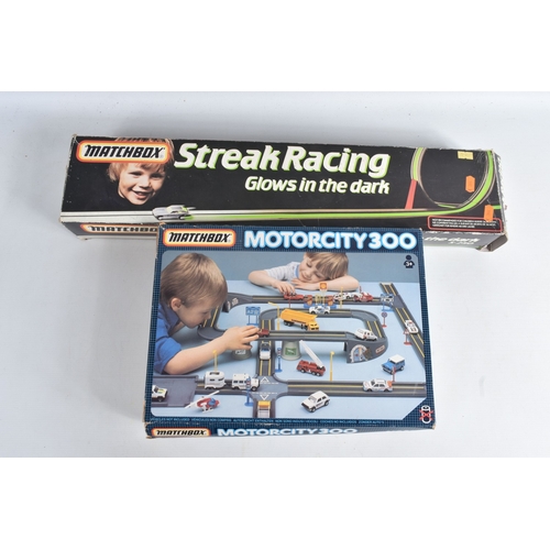 196 - A QUANTITY OF BOXED MATCHBOX SETS AND COLLECTABLE GARAGES, to include an unboxed Lesney Matchbox ESS... 