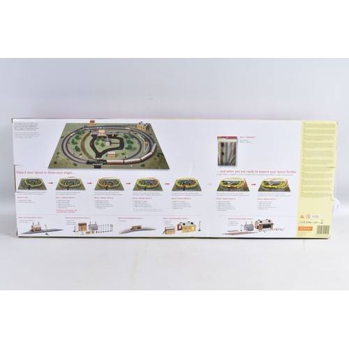 242 - A BOXED HORNBY RAILWAYS OO GAUGE THE BLUE HIGHLANDER TRAIN SET, No.R1101, appears largely complete w... 