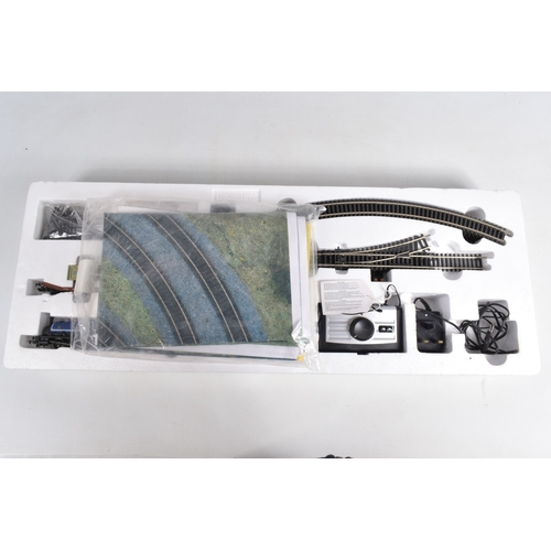 242 - A BOXED HORNBY RAILWAYS OO GAUGE THE BLUE HIGHLANDER TRAIN SET, No.R1101, appears largely complete w... 