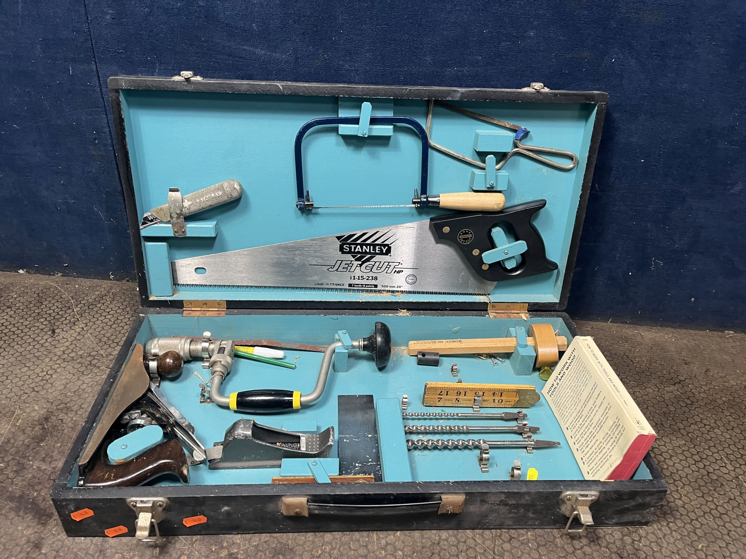 A CARPENTERS TOOLBOX containing a Stanley No.3 plane, brace, saw ...