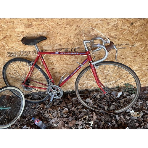 4 - A PEUGEOT EQUIPE VINTAGE RACING BIKE with 10-speed Sachs gears, 20in frame and a Hercules folding bi... 