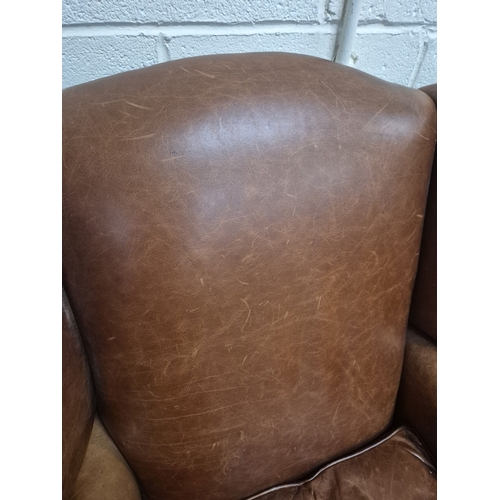 202 - A LAURA ASHLEY TANNED LEATHER WING BACK ARMCHAIR, raised on front cabriole legs, width 81cm x depth ... 
