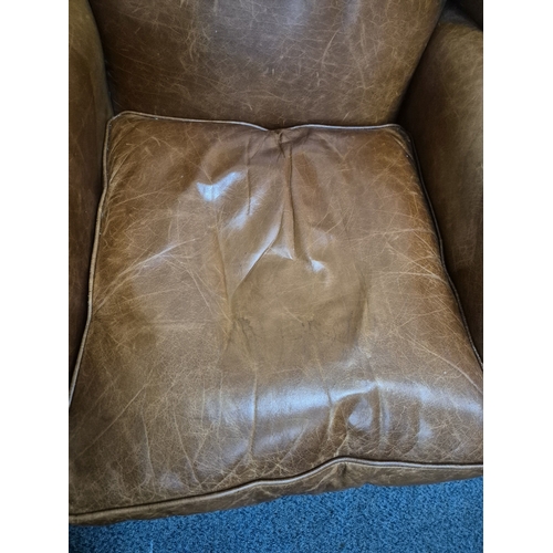 202 - A LAURA ASHLEY TANNED LEATHER WING BACK ARMCHAIR, raised on front cabriole legs, width 81cm x depth ... 
