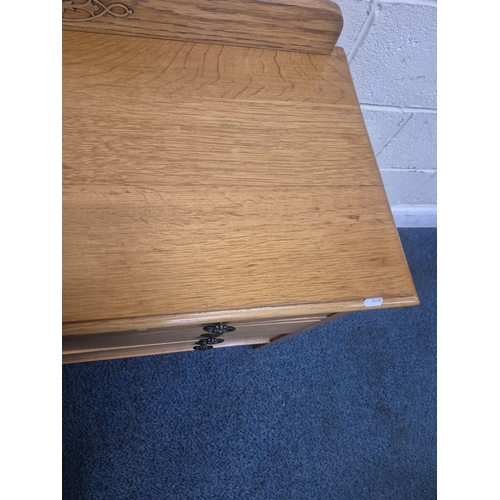 204 - AN OAK LEDGE BACK CHEST OF THREE LONG DRAWERS, width 92cm x depth 46cm x height 83cm, condition repo... 
