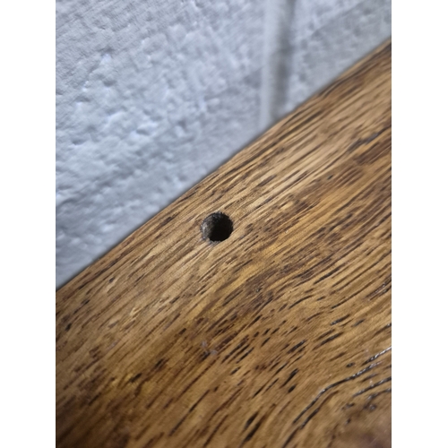 205 - AN EARLY 20TH CENTURY OAK  CHEST OF THREE LONG DRAWERS, raised on turned legs with castors, width 92... 