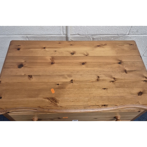 207 - A MODERN PINE SERPENTINE CHEST OF FIVE LONG DRAWERS, raised on bun feet, width 80cm x depth 49cm x h... 