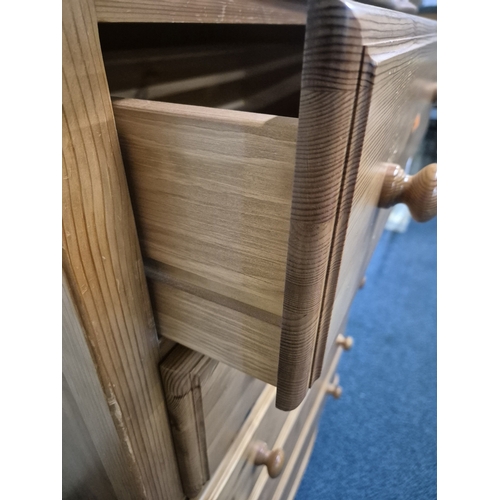 207 - A MODERN PINE SERPENTINE CHEST OF FIVE LONG DRAWERS, raised on bun feet, width 80cm x depth 49cm x h... 