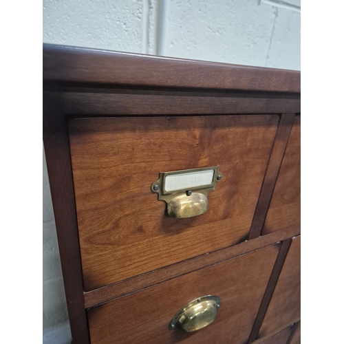 208 - A MODERN APOTHECARY STYLE BANK OF NINE DRAWERS, varying in size, width 110cm x depth 46cm x height 1... 