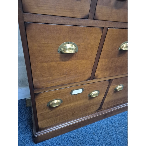 208 - A MODERN APOTHECARY STYLE BANK OF NINE DRAWERS, varying in size, width 110cm x depth 46cm x height 1... 