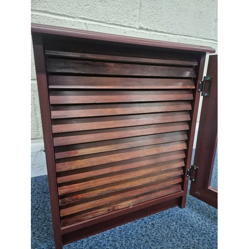 209 - A REPRODUCTION MAHOGANY EFFECT COLLECTORS CABINET, the single glass door enclosing fourteen shallow ... 