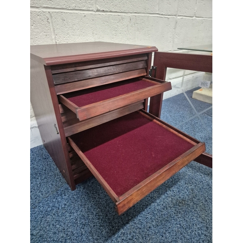 209 - A REPRODUCTION MAHOGANY EFFECT COLLECTORS CABINET, the single glass door enclosing fourteen shallow ... 